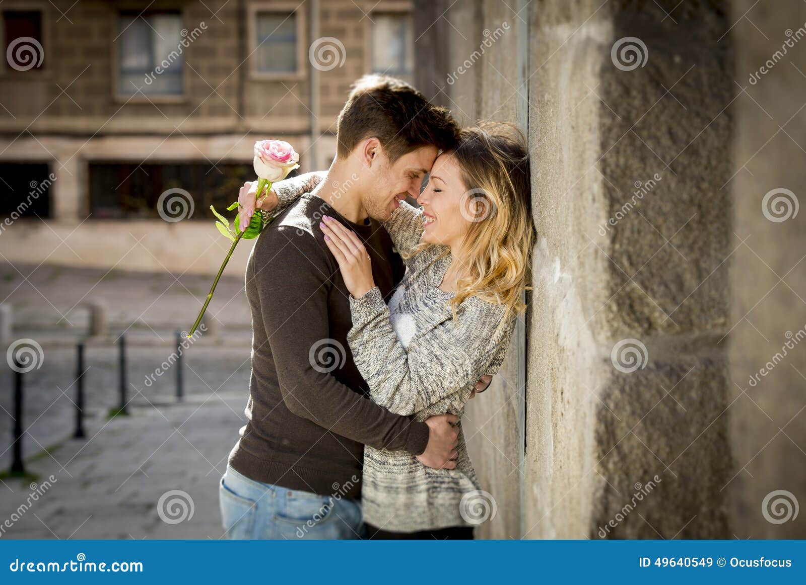 https://thumbs.dreamstime.com/z/candid-portrait-beautiful-european-couple-rose-love-kissing-street-alley-celebrating-valentines-day-romantic-49640549.jpg