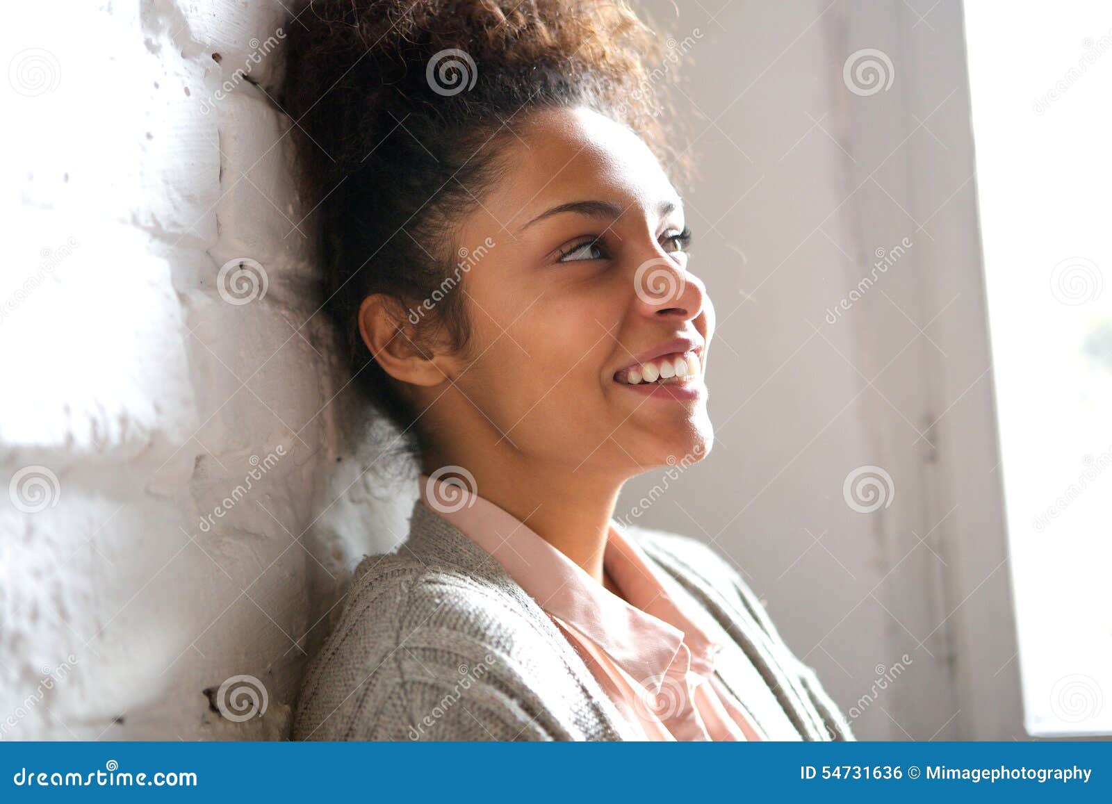 candid portrait of a smiling young woman