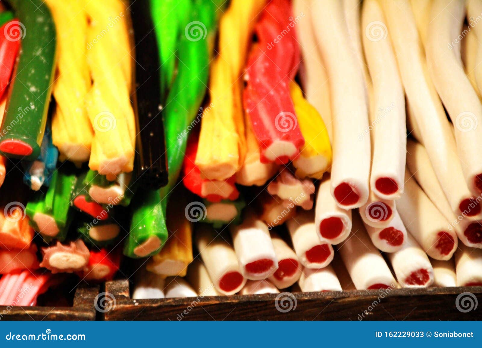 candies of various colors and flavors in a street stall
