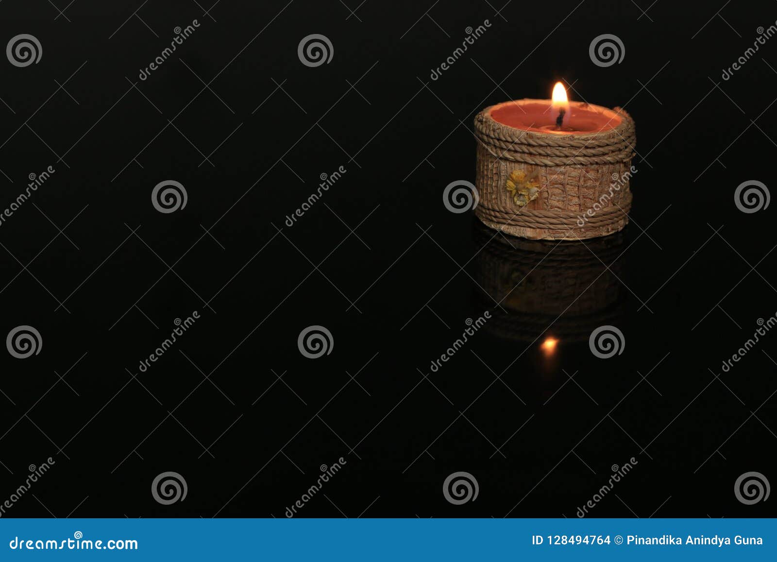 Candle on black glass stock photo. Image of glass, hair 128494764