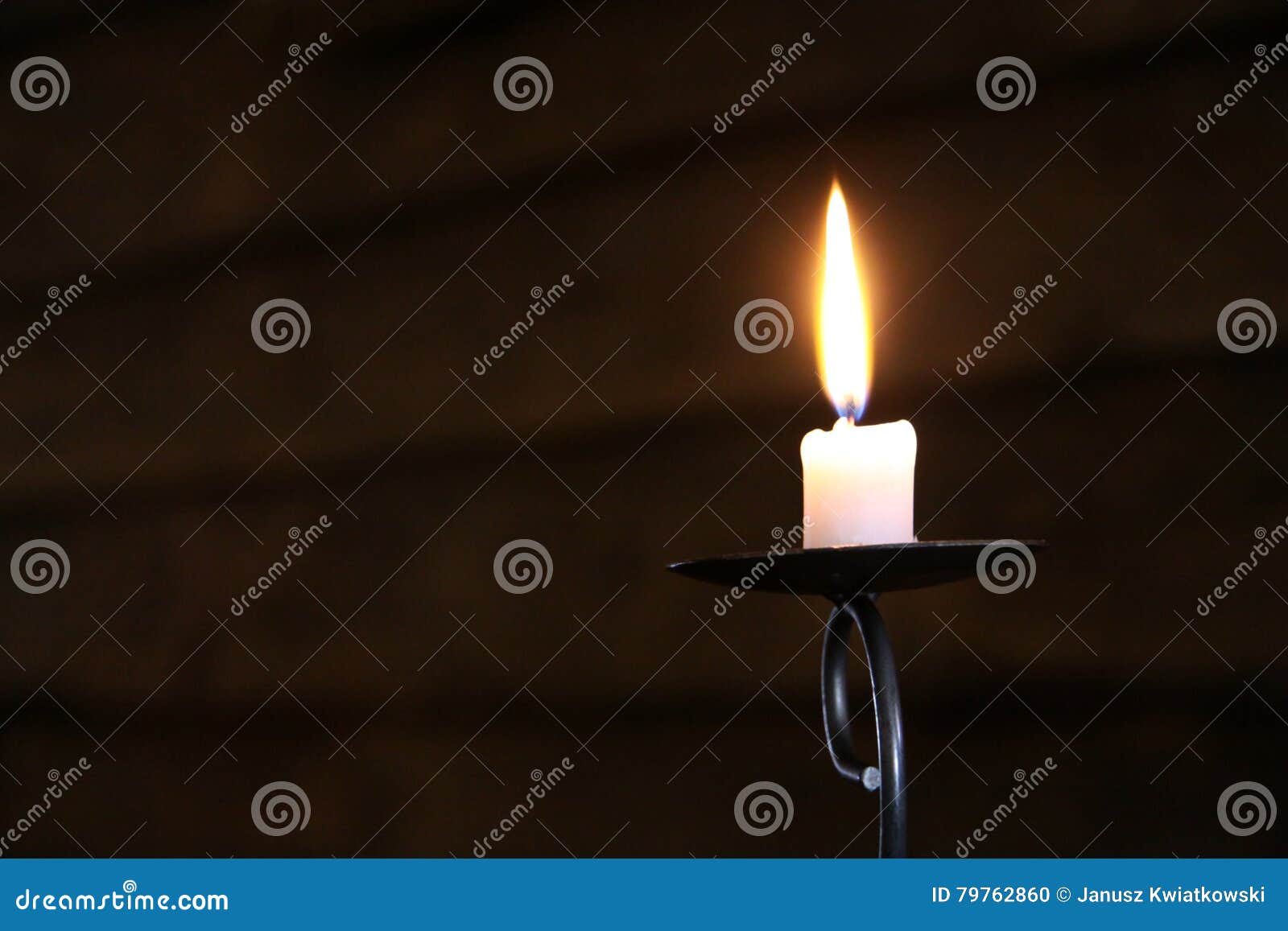 Candle burning in the dark stock photo. Image of illuminating 79762860