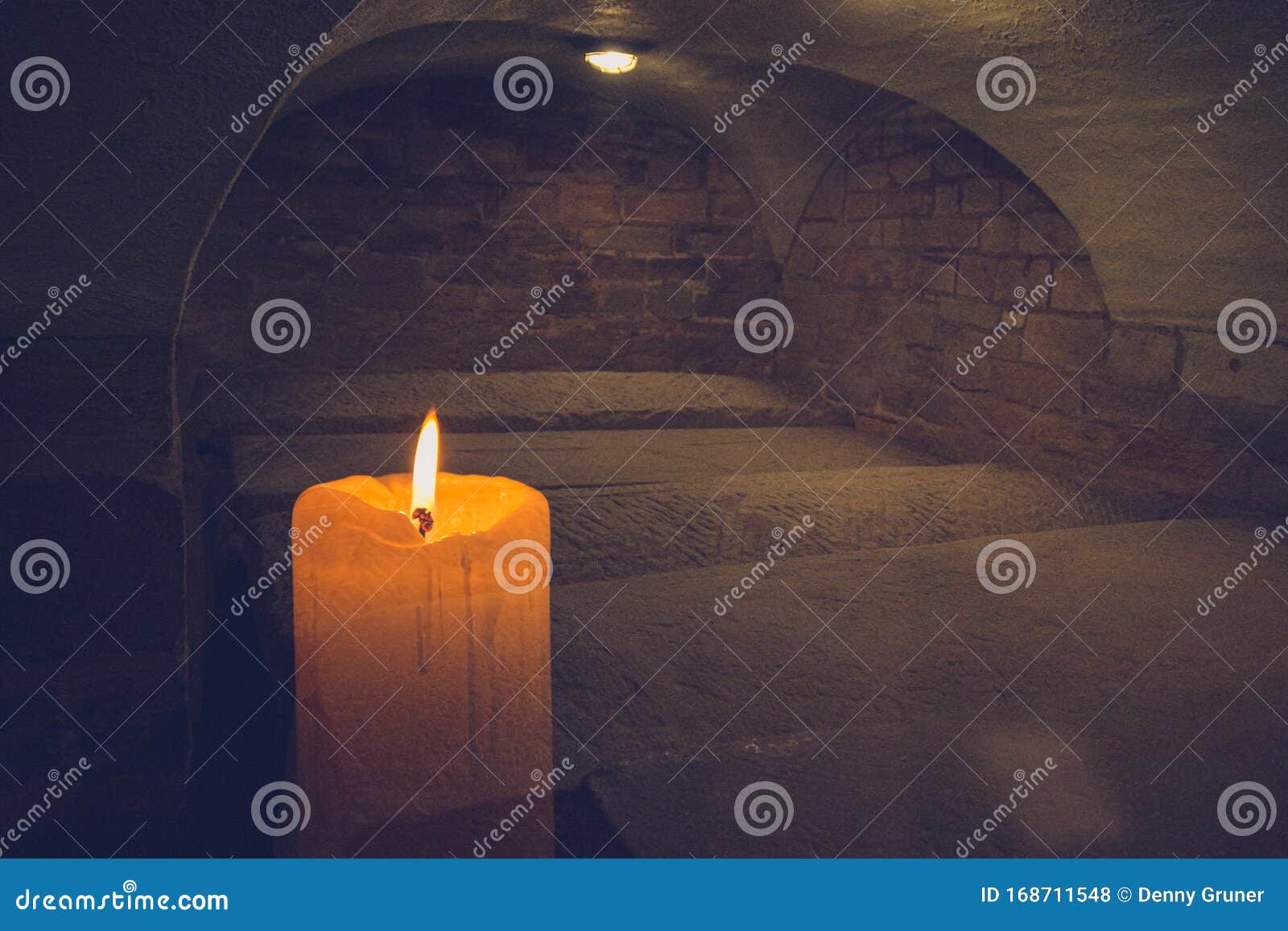A Candle in a Dark Old Burial Chamber Stock Photo Image of sorrow
