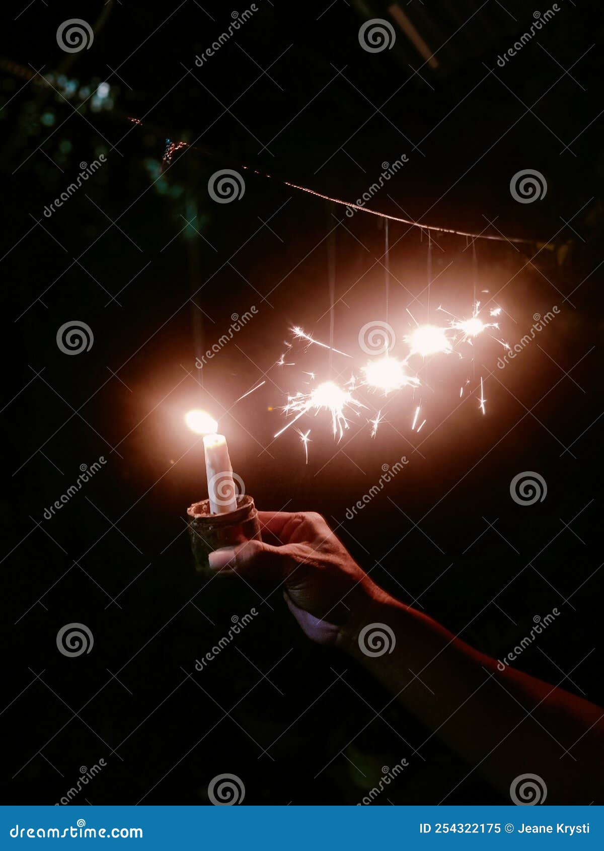 A Candle with fireworks stock image. Image of font, poster 254322175