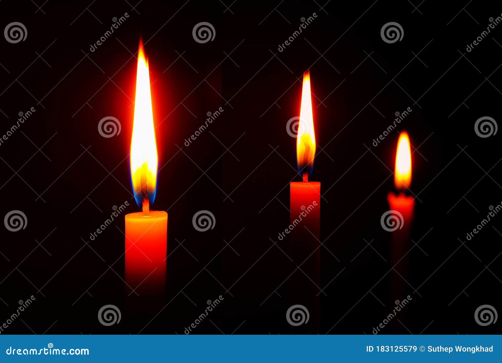 Candle Flame At Night. Candle Lit In A Dark Room With Dark Background