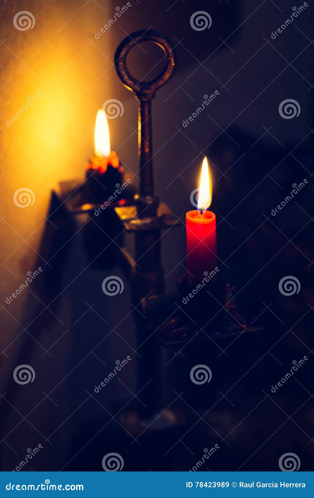 Candle Flames Glowing in the Dark. Vintage Candlestick Stock Image