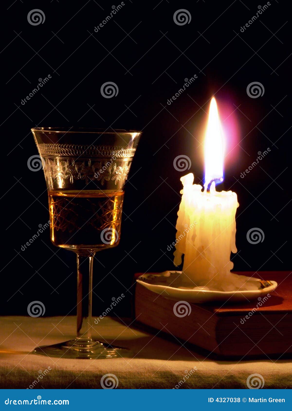 Candle and Glass stock photo. Image of illumination, fashioned 4327038