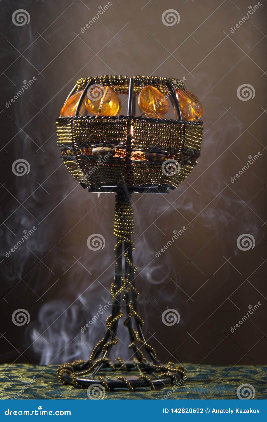 Candle holder in smoke stock photo. Image of decoration 142820692