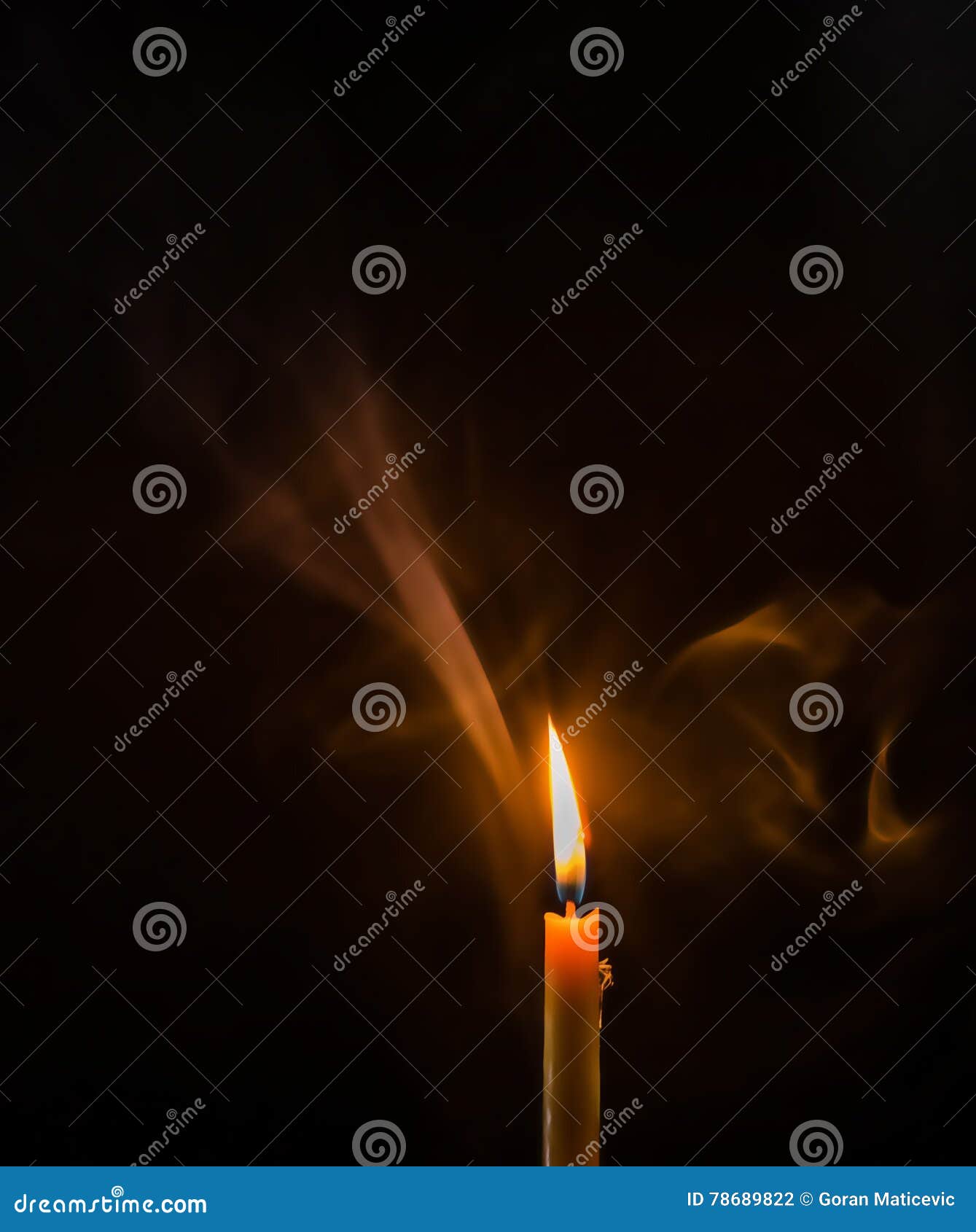 Candle Light in Dark Room with Smoke in Background Stock Photo Image