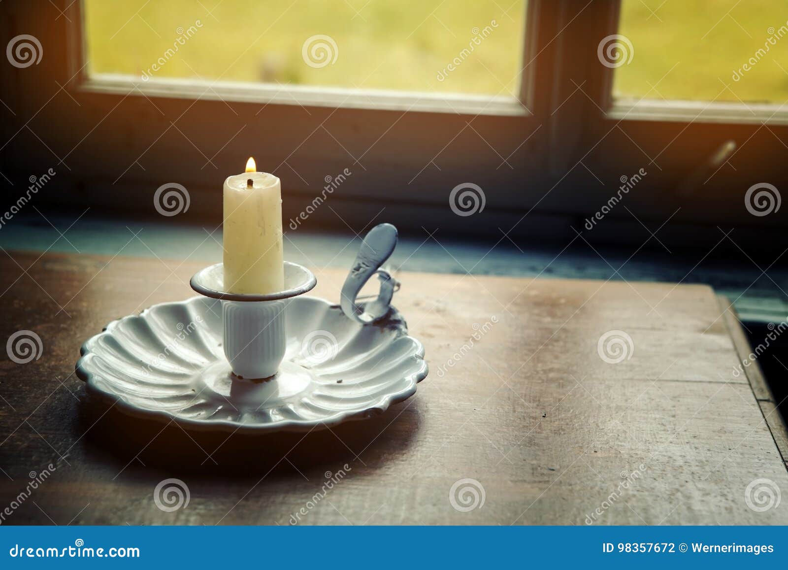 Candle and Old Candle Holder by the Window Stock Photo Image of flame