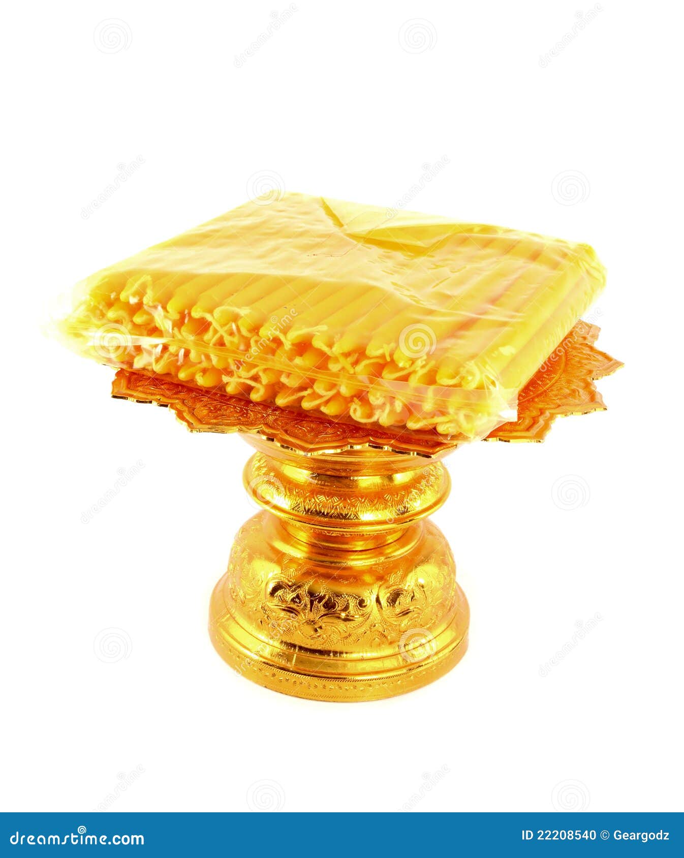 Candle pack on golden tray stock photo. Image of church 22208540