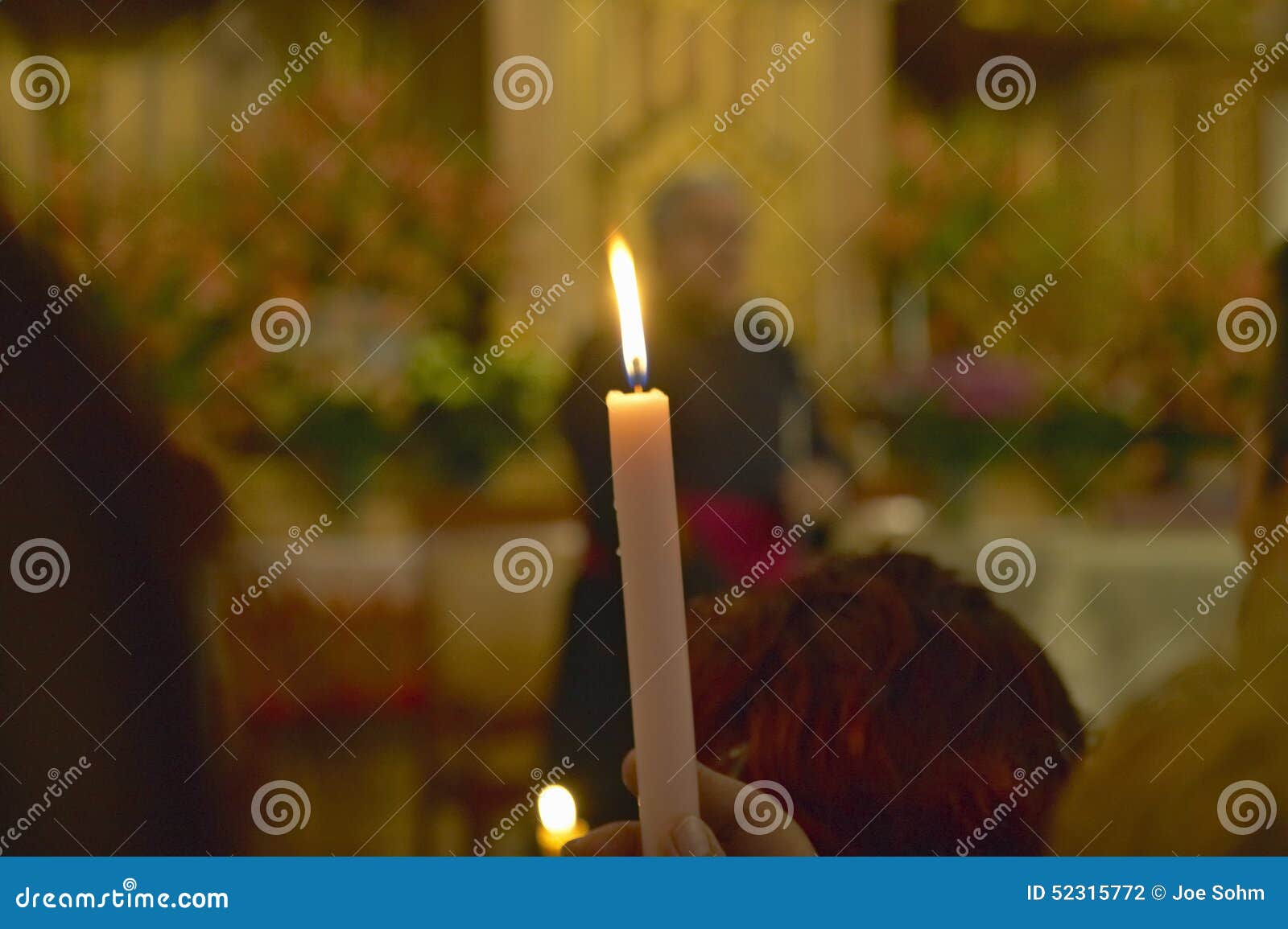 a candle in san lazaro catholic church, el rincon, cuba,