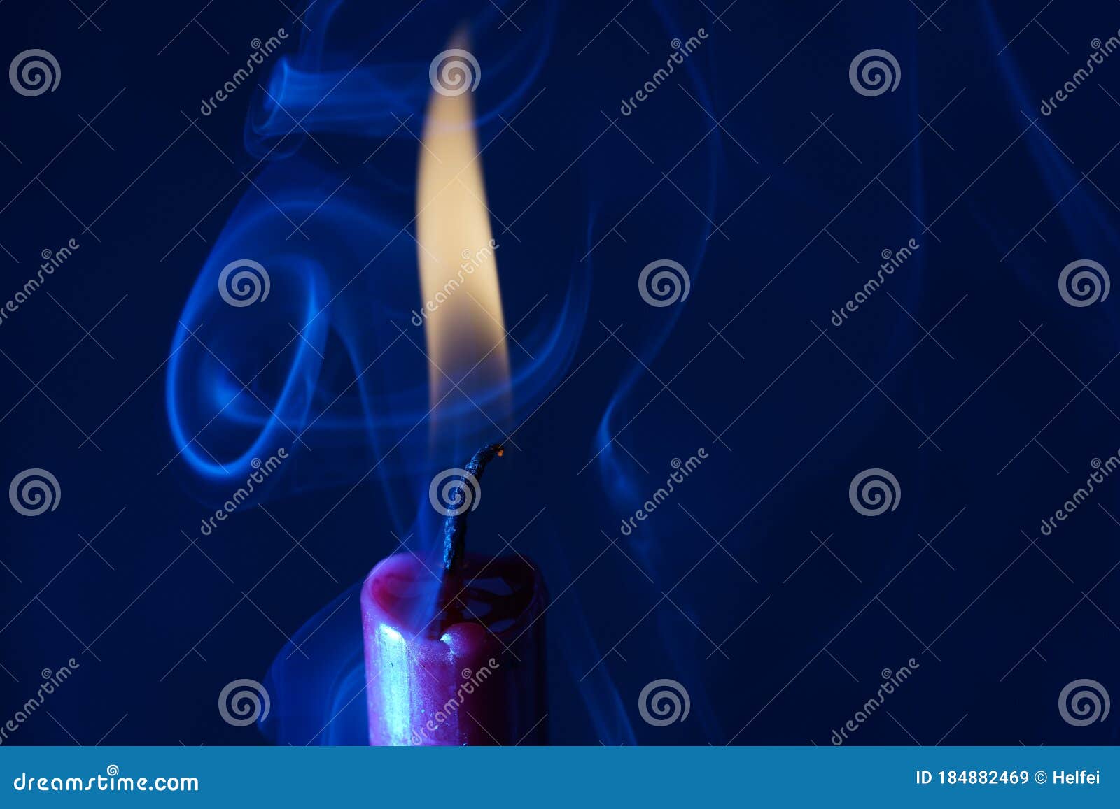 Candle with Smoke and Flame Photographed in the Studio with Color Foils