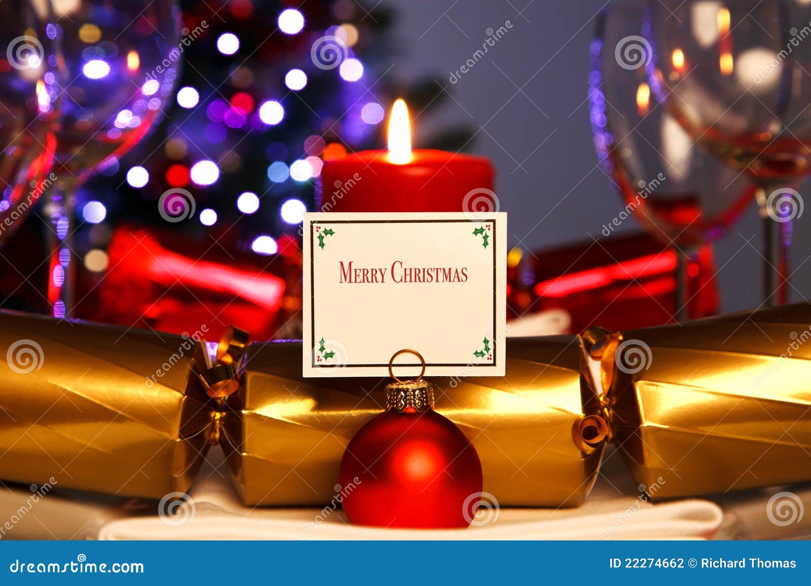 Photo of a Christmas dinner place setting and bauble card holder with 