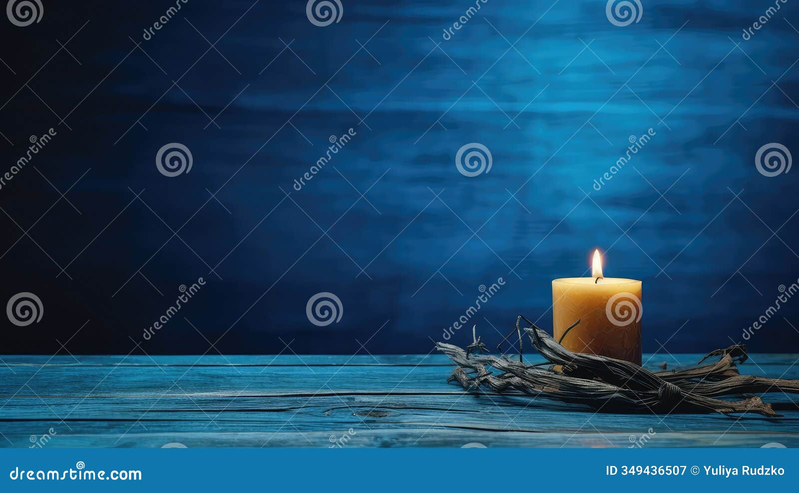 candlelight dinner setting on rustic wooden table against a serene blue backdrop, perfect for romantic and intimate