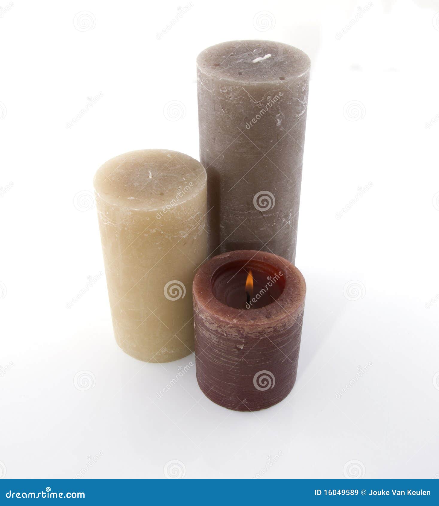 Several candles on a white background.
