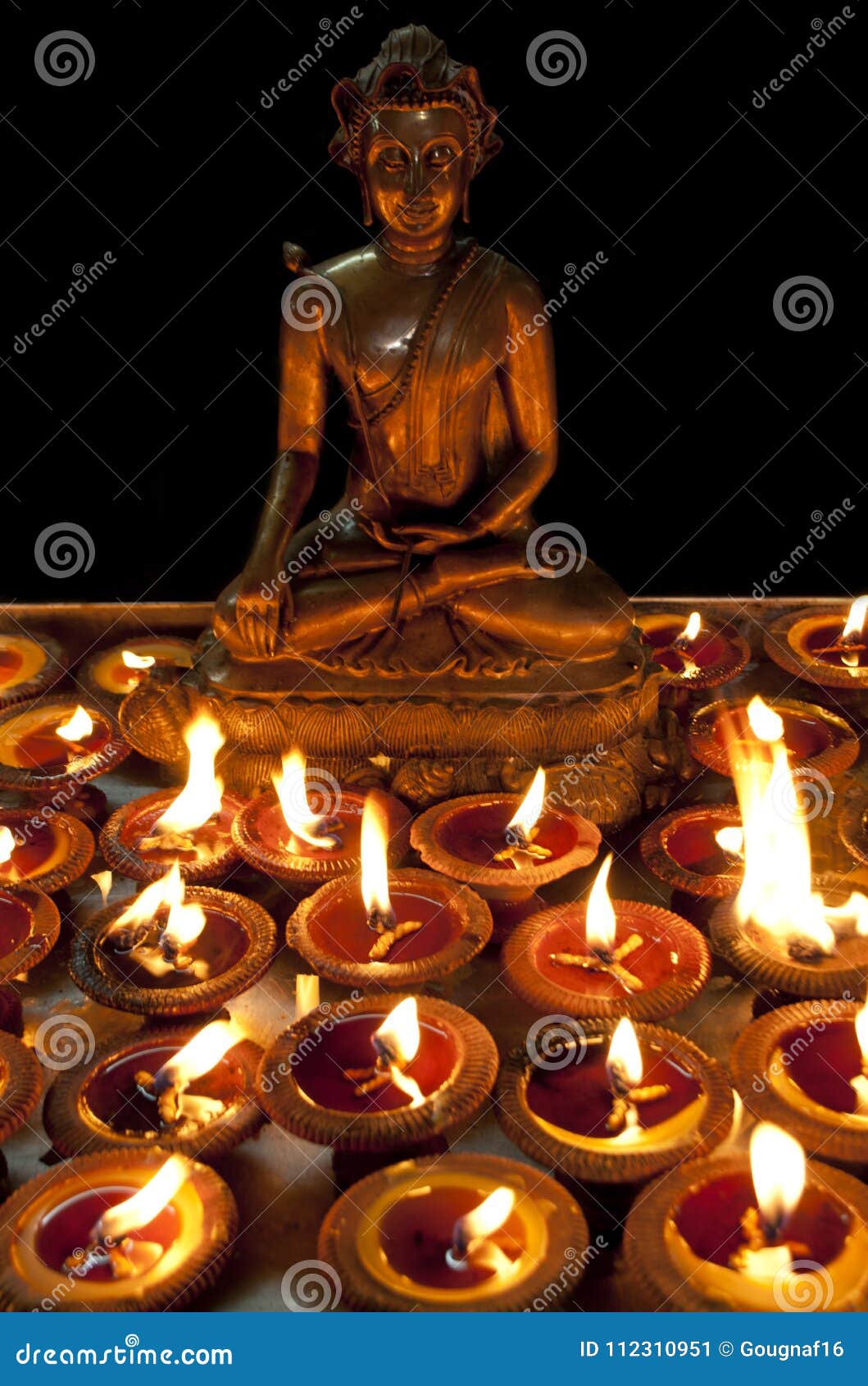 Candles and Buddha Statuette Stock Image Image of asian, religious