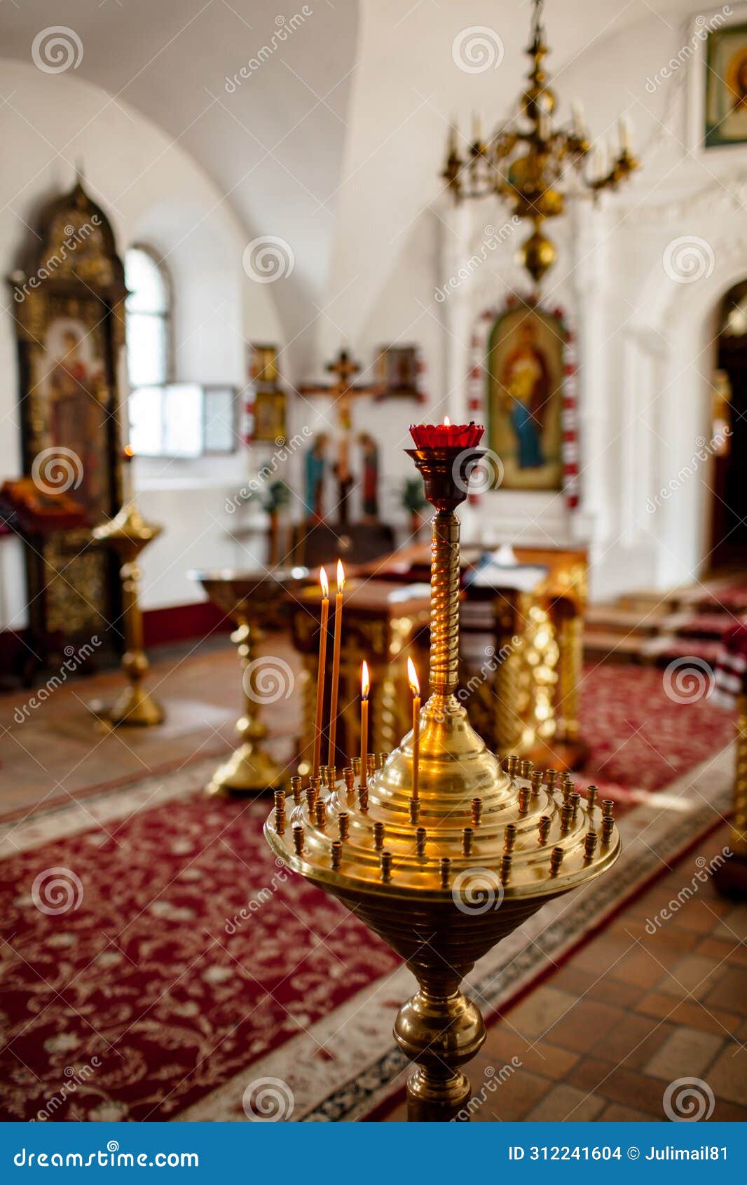 candles in the candle for churches. photo of the illuminated cerca and candle in the candle