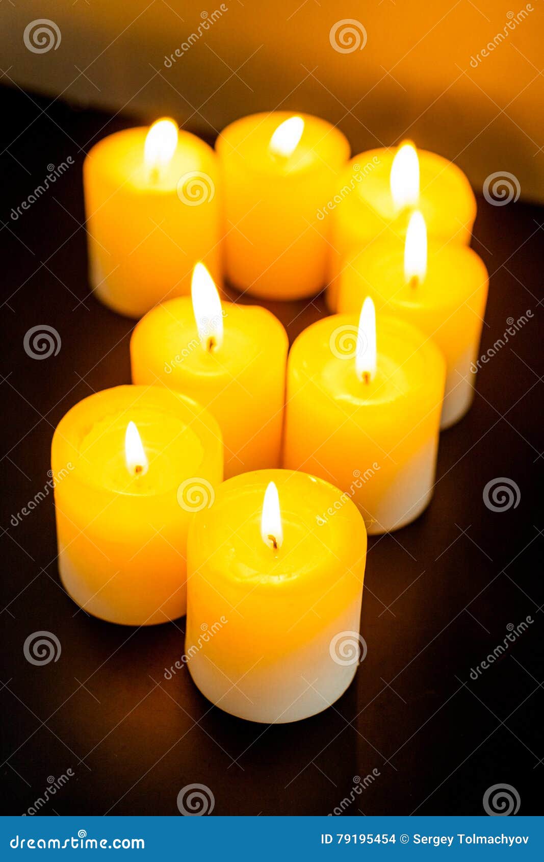 Candles in darkness stock photo. Image of holiday, tealights 79195454