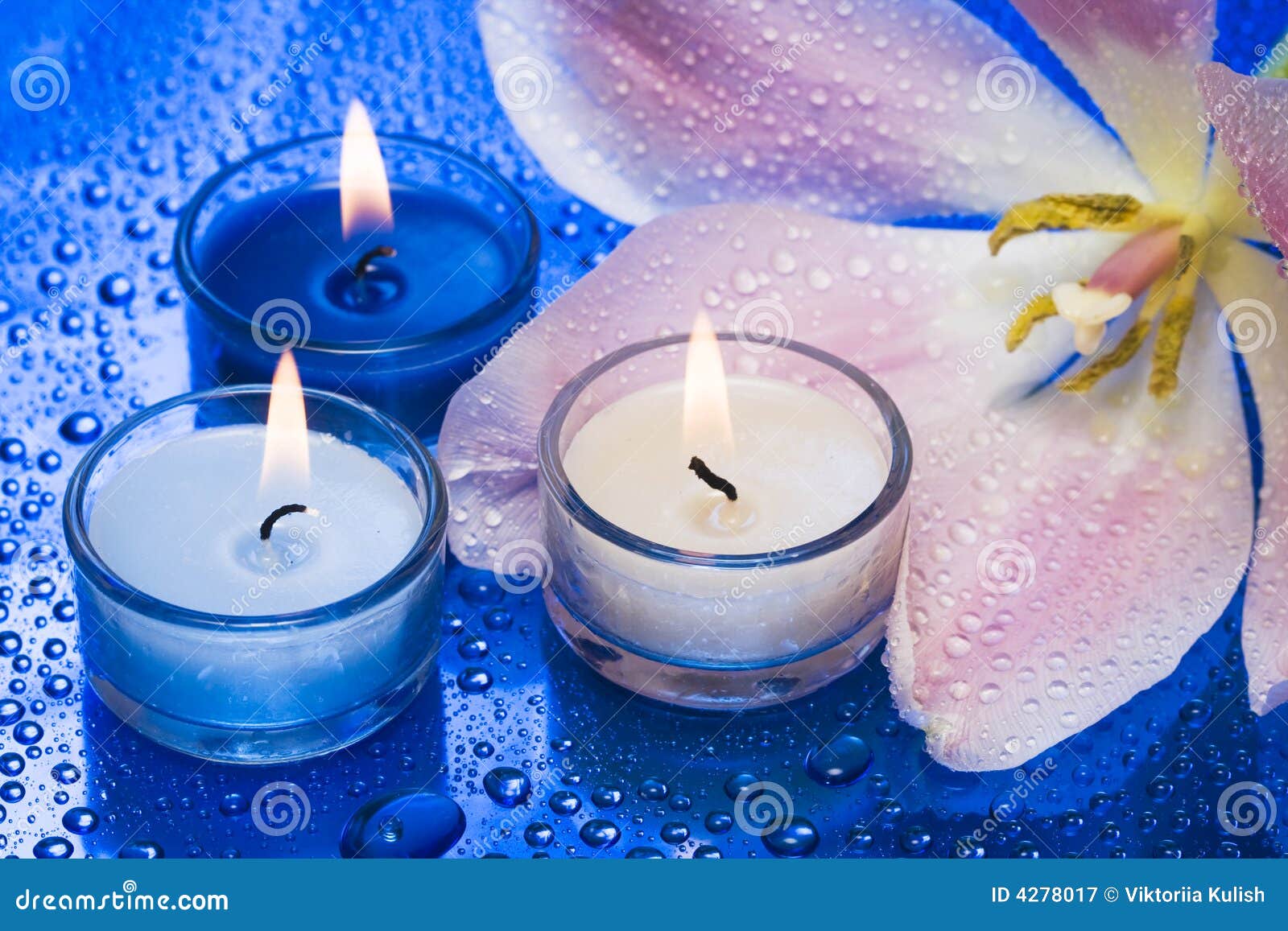 Candles with flower stock image. Image of droplet, care 4278017