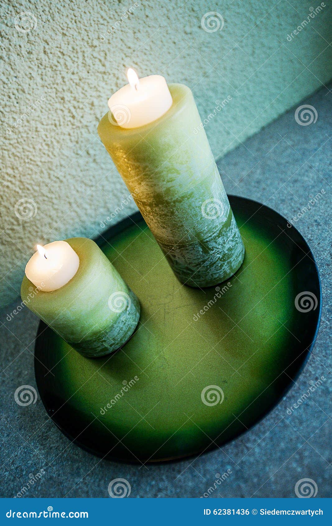 2 candles on the plate. stock photo. Image of night, romantic 62381436