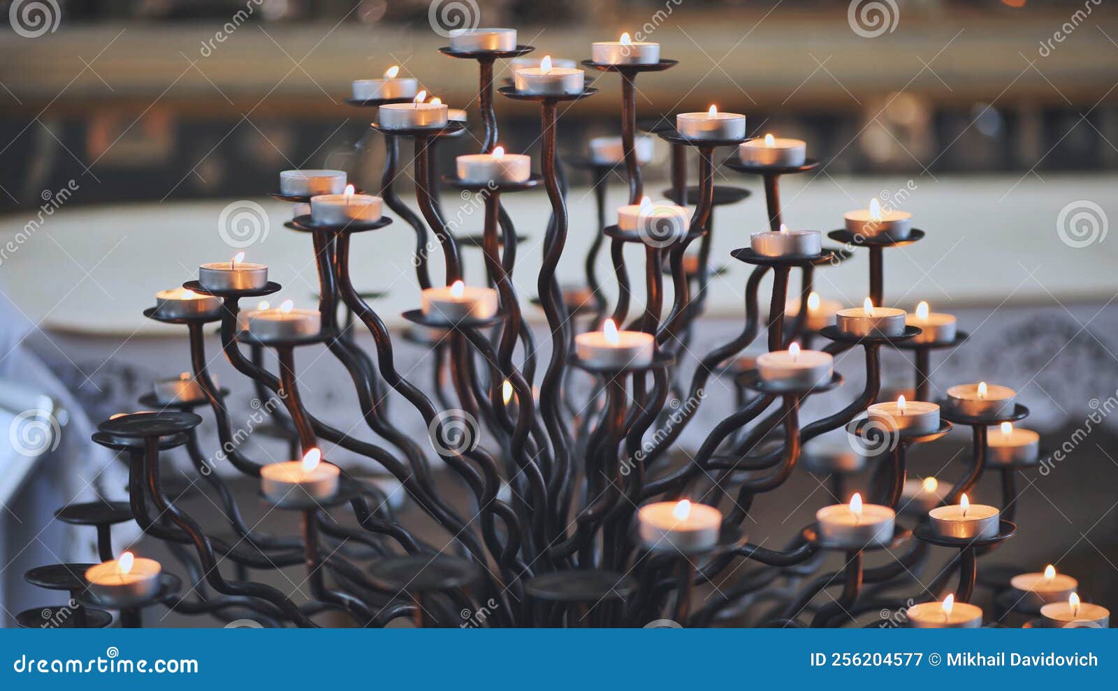 Candlestick Holder with Burning Candles in a Catholic Church. Stock Image Image of christ