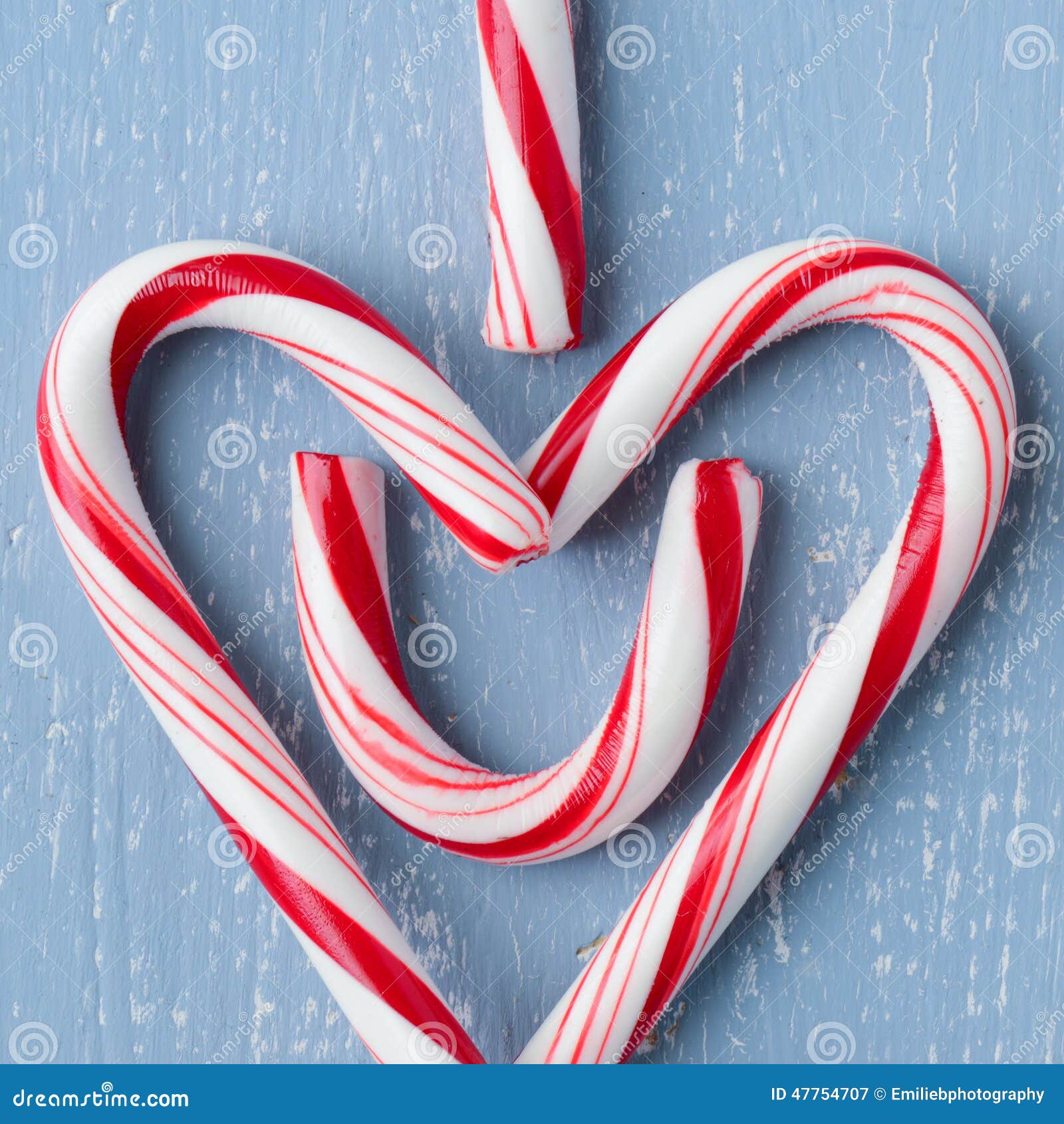 Candy Cane Heart Symbol on Blue Wood Centered Square Stock Image ...