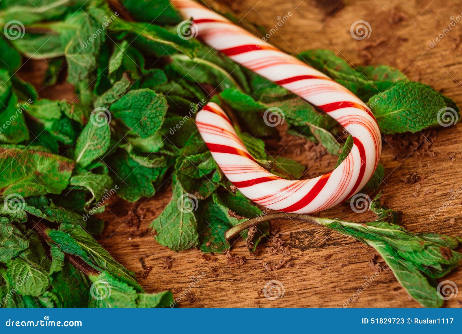 Candy Canes with Mint Leaves on a Wooden Background Stock Image Image