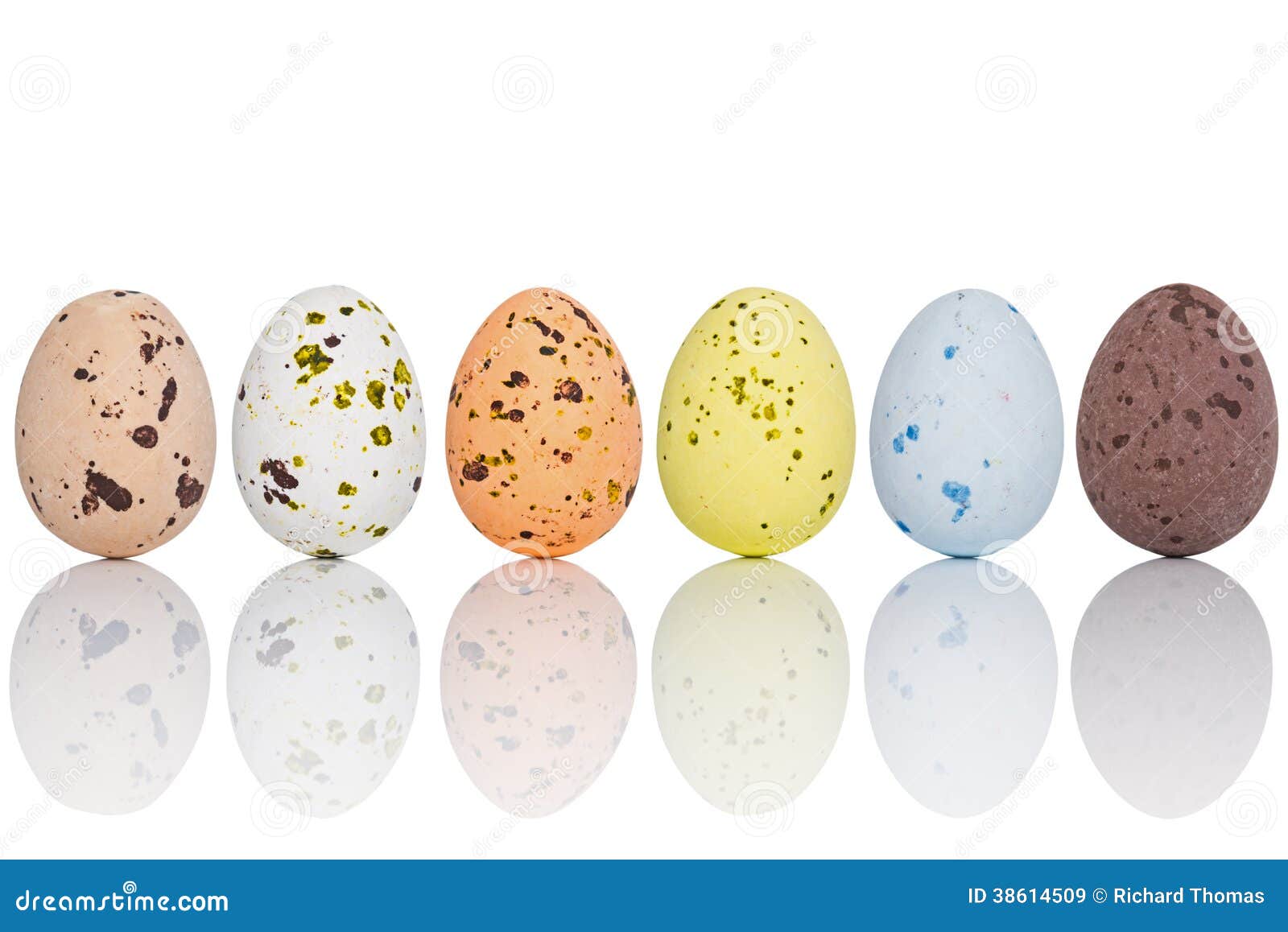 Candy Covered Easter Eggs in a Line Stock Image Image of eggshell