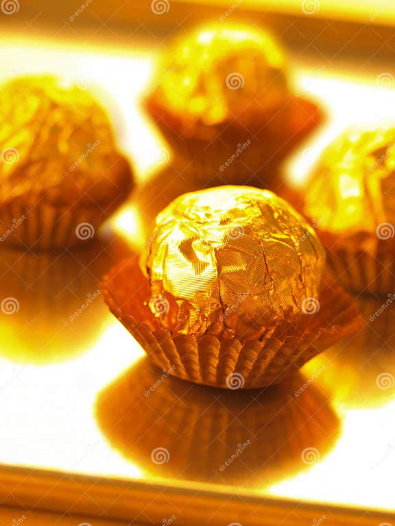 Candy in gold wrapper stock photo. Image of color, candies 14491748