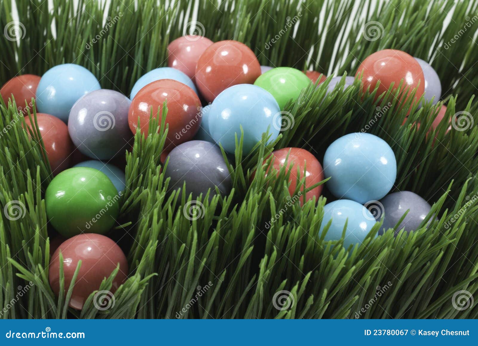 Candy gumballs in grass stock image. Image of collection 23780067