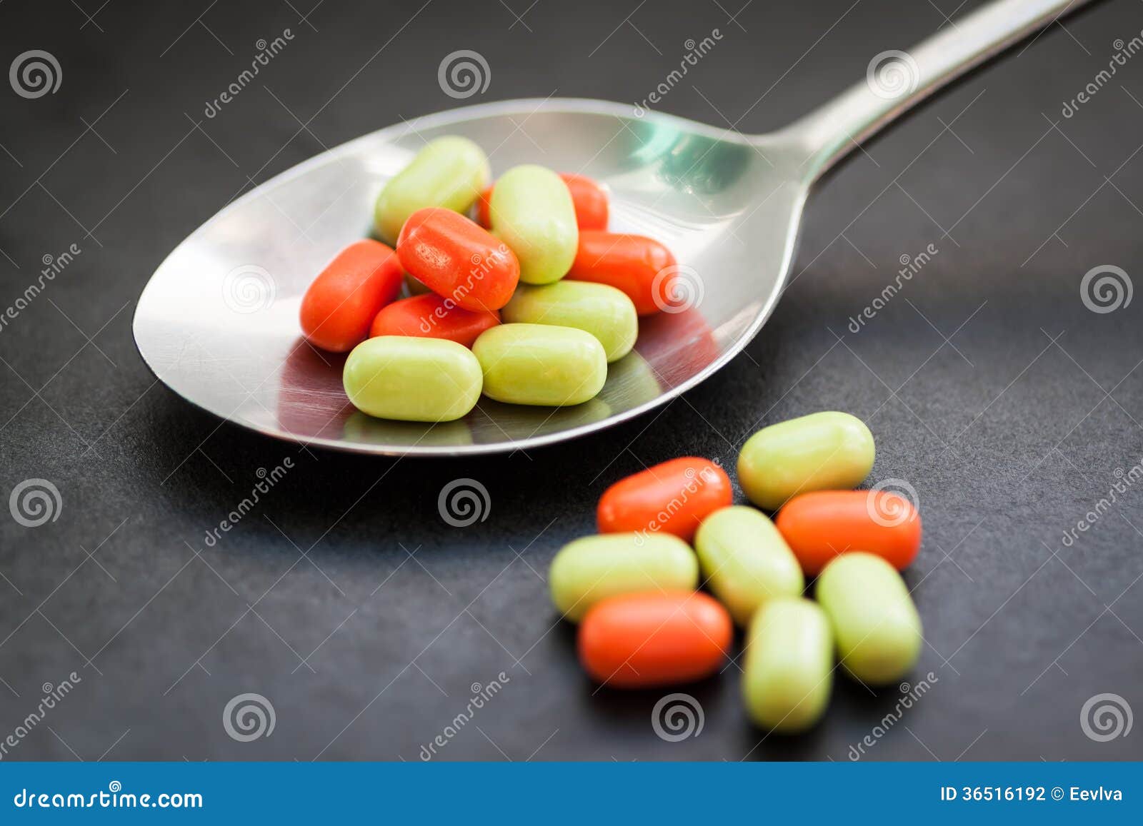 Candy in metal spoon. stock photo. Image of cooking, care 36516192