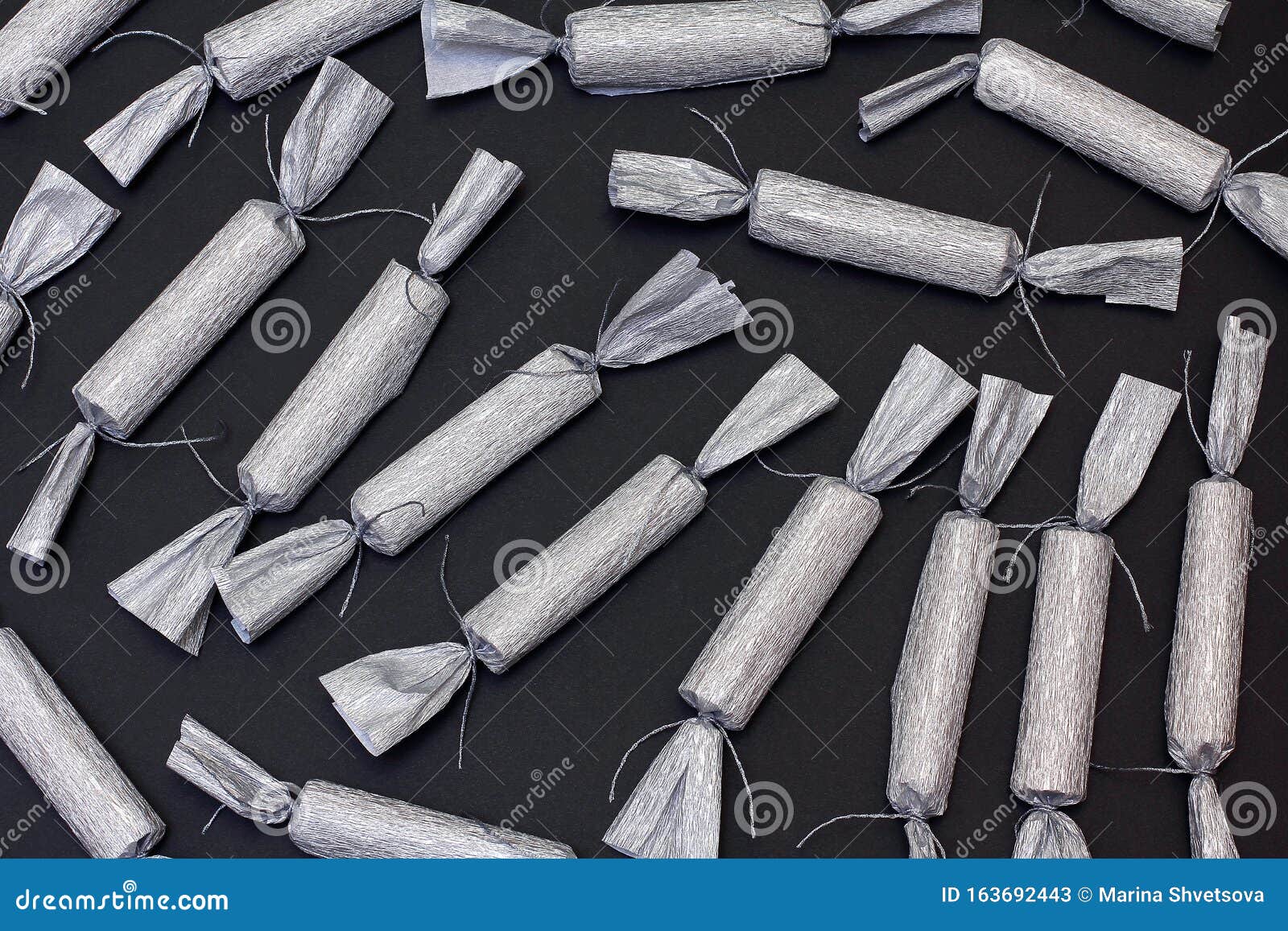 Candy in a Silver Wrapper on a Black Background. New Year Decor Stock Image Image of candy