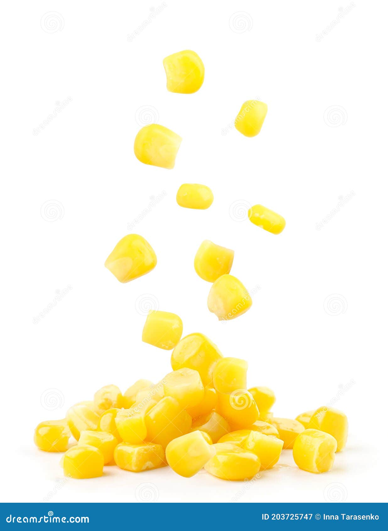 Canned Corn Falls on a Heap on a White Background. Isolated Stock Image