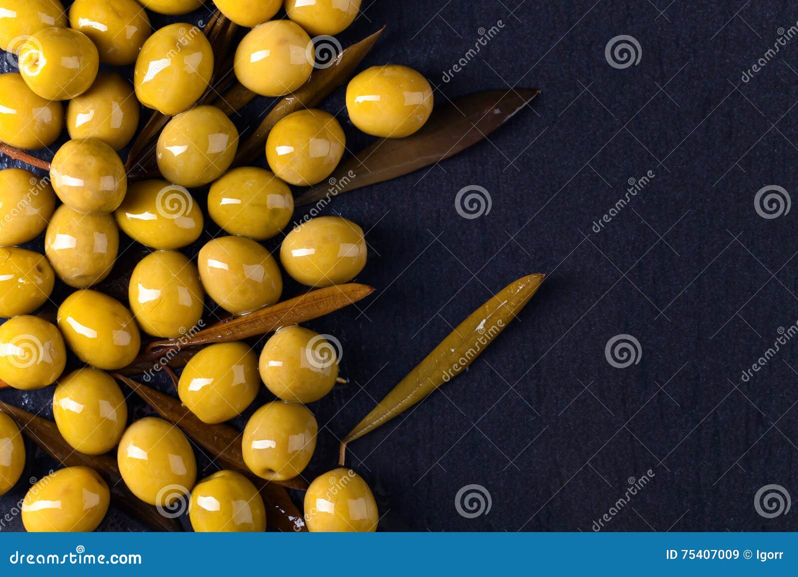 Canned green olives stock image. Image of leaf, ingredient 75407009