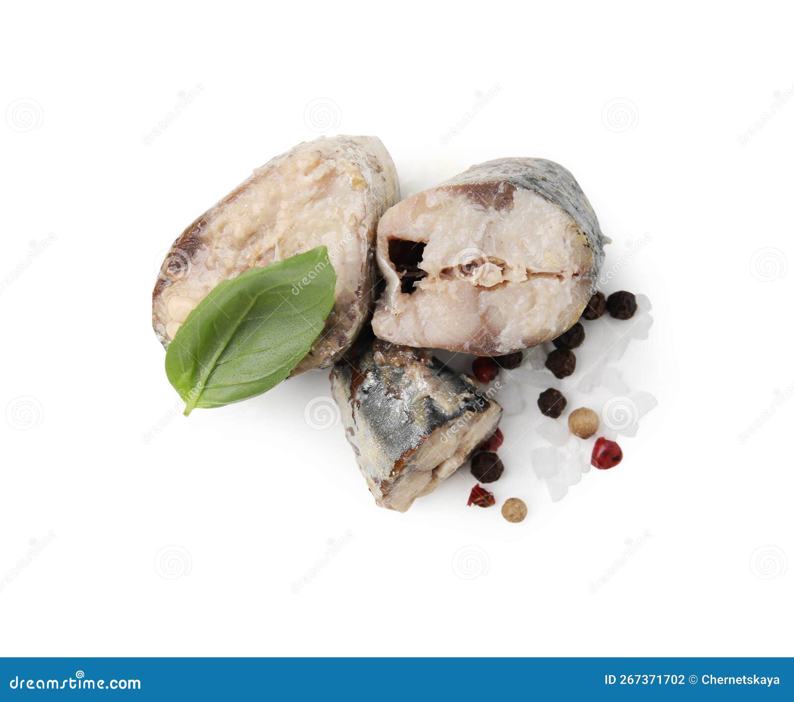 Canned Mackerel Chunks with Basil and Peppercorns on White Background, Top View Stock Photo