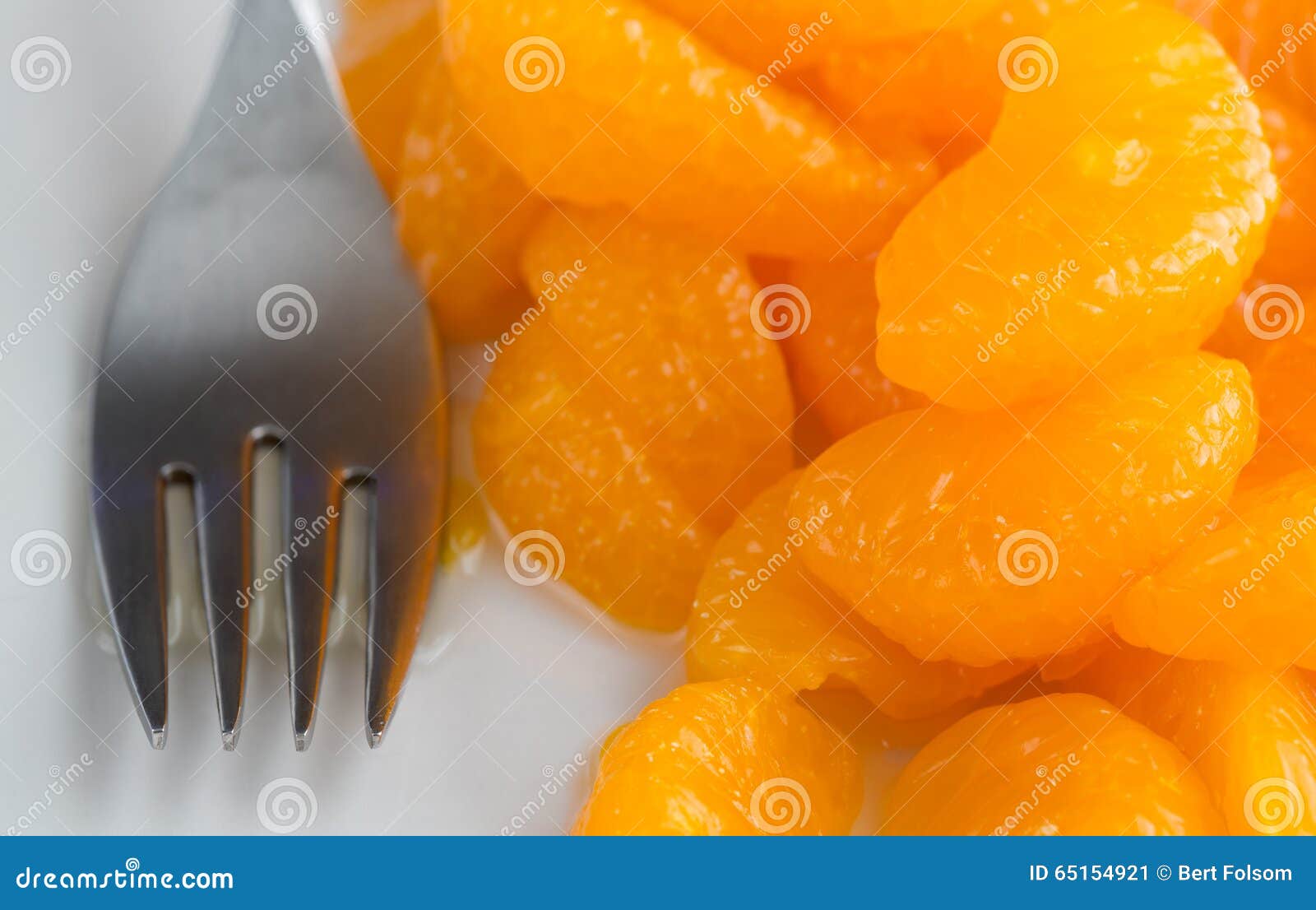 Canned Mandarin Oranges on a Plate with Fork Stock Image Image of