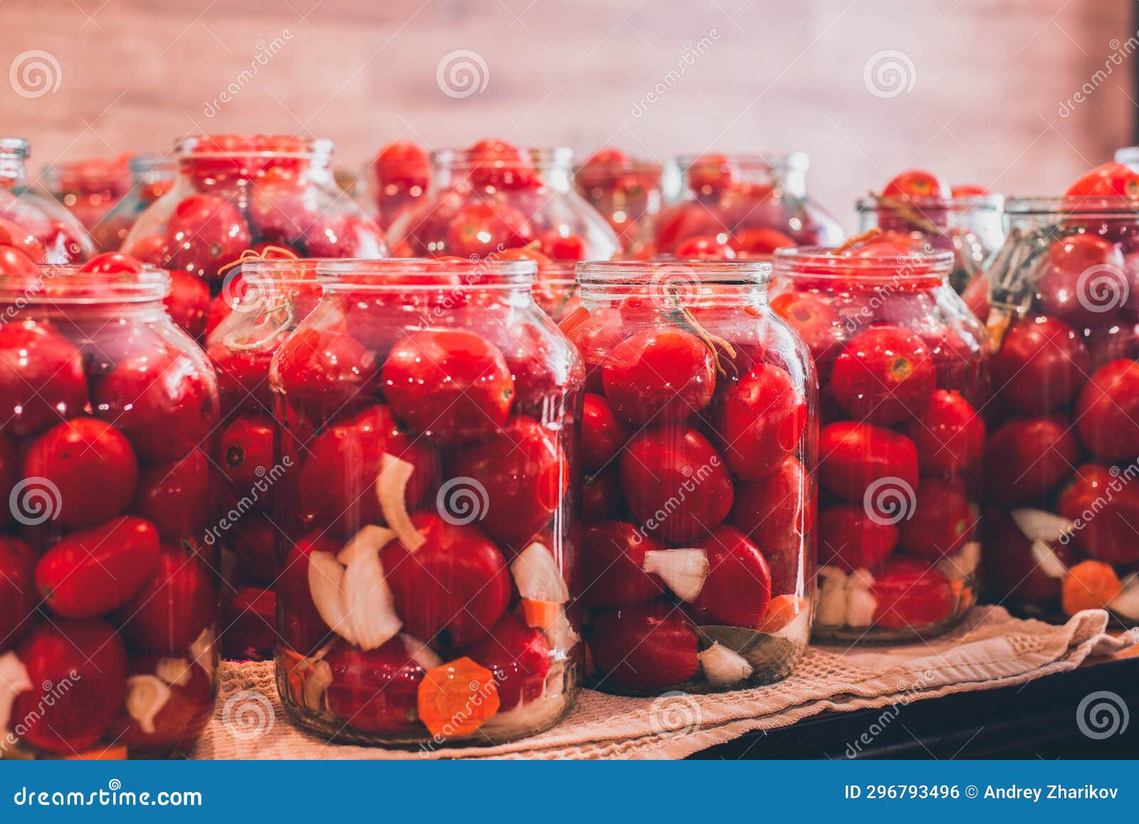 Canned Tomatoes in Cans. the Process of Preservation of Vegetables for