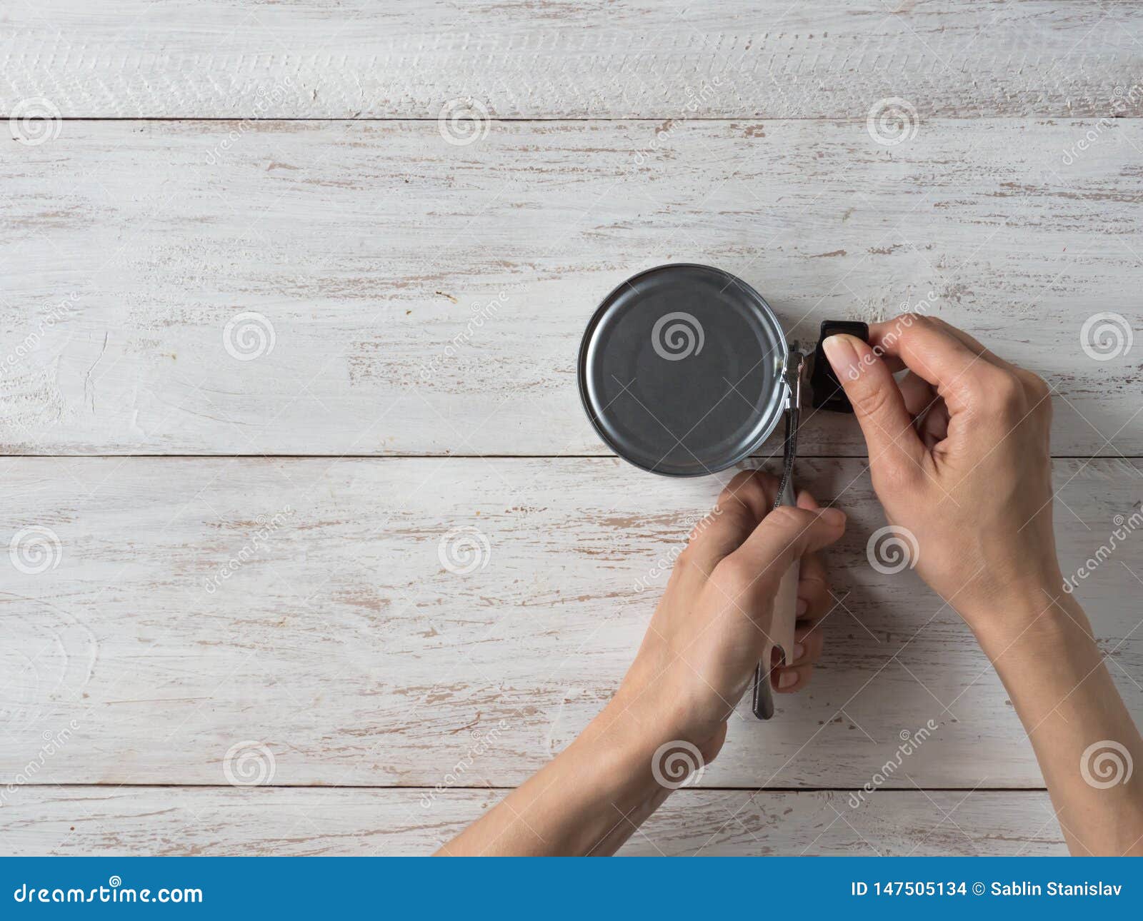 Canning Knife Opens the Jar. Top View. Stock Photo Image of device