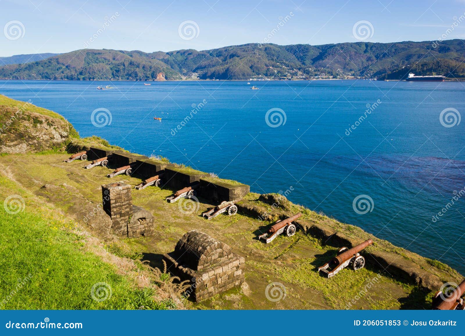 cannons lined up pointing to the sea in fort niebla