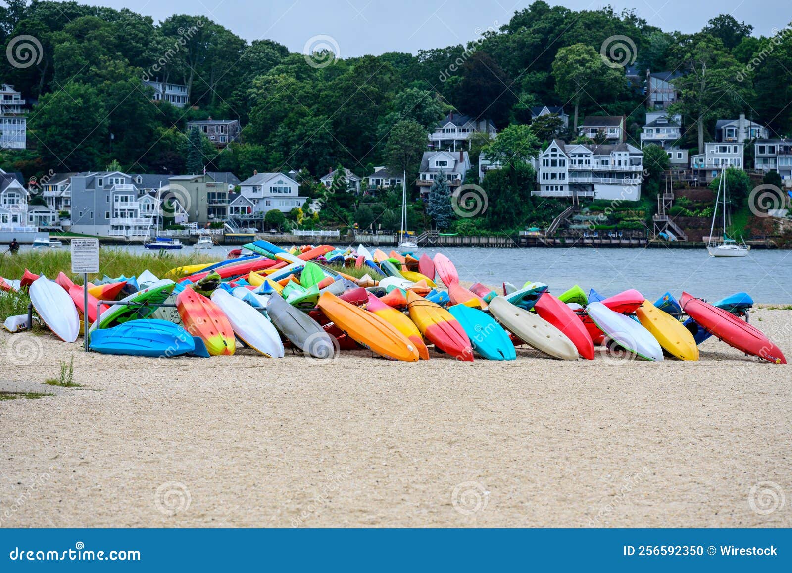 Canoe boats in Centerport stock photo. Image of water 256592350