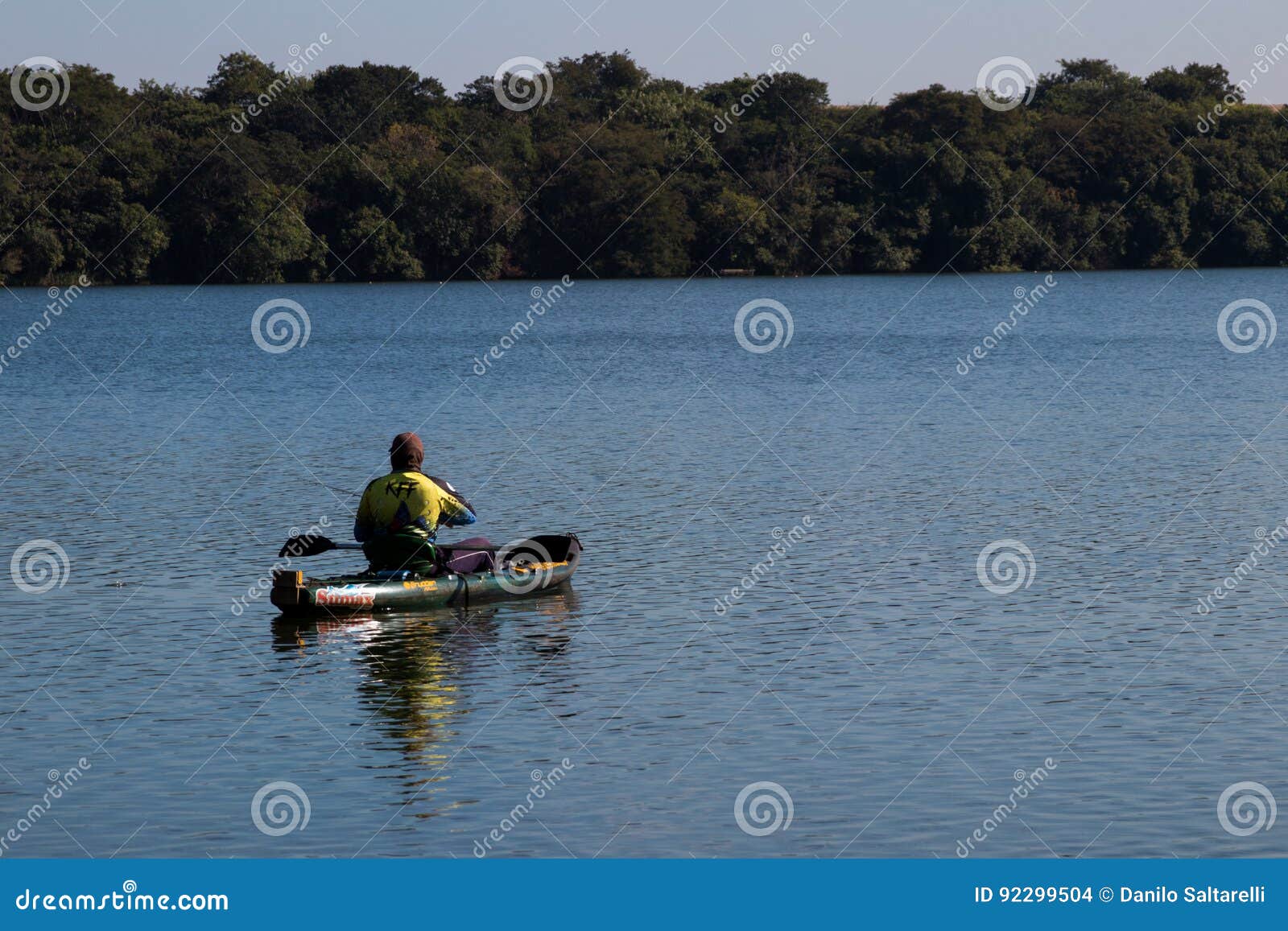 Canoe fisherman editorial stock image. Image of sunset 92299504
