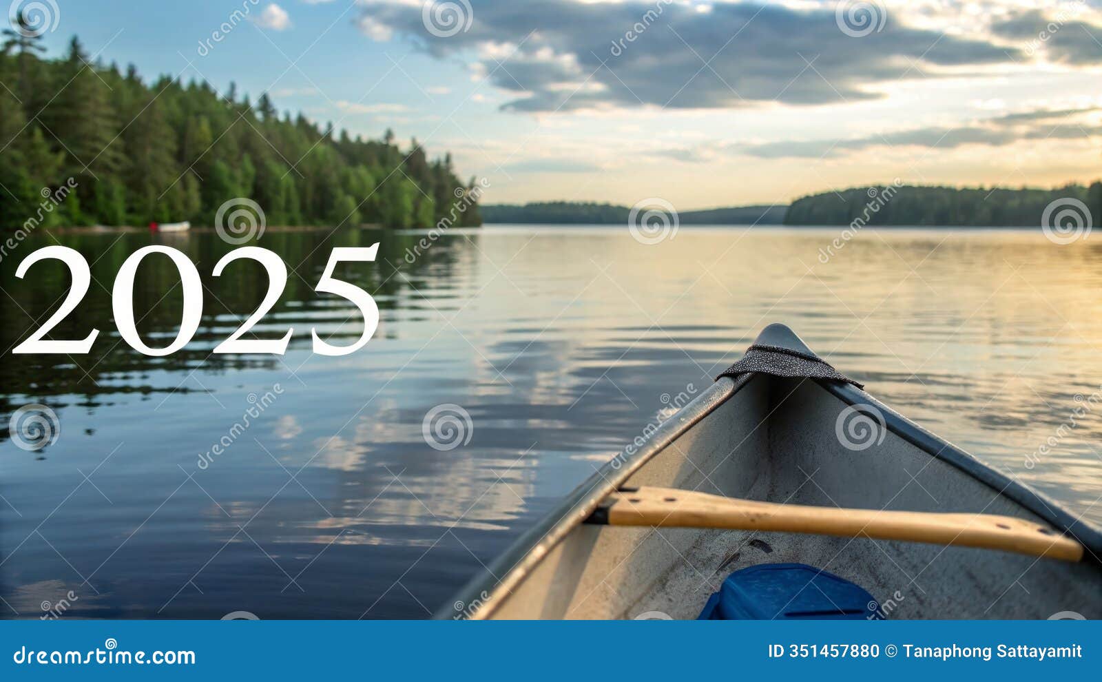 2025 canoe trip on calm lake tranquil lake scene canoe journey serene nature peaceful adventure year 2025 a  of