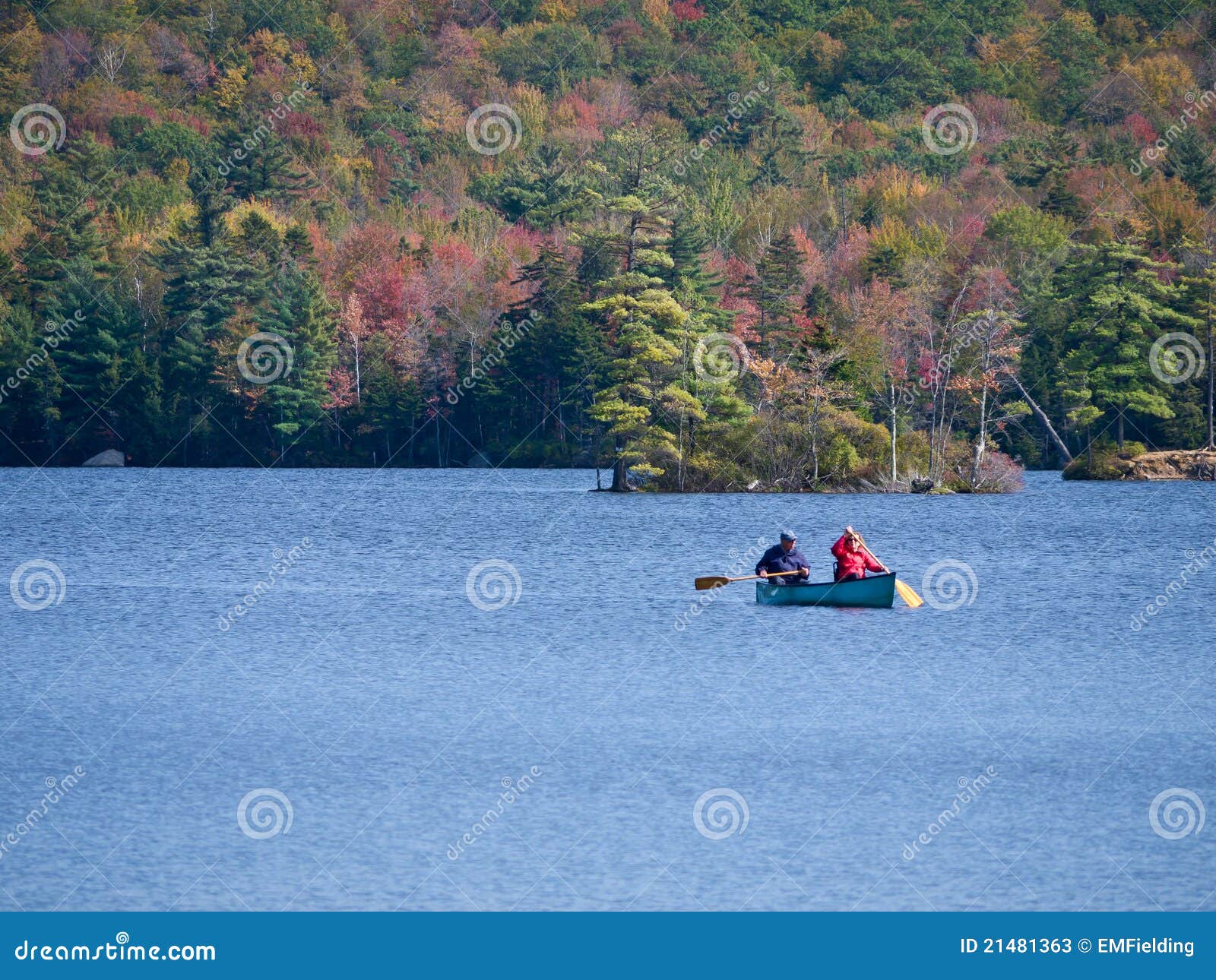 Canoeing On Lake In Fall Stock Photos - Image: 21481363