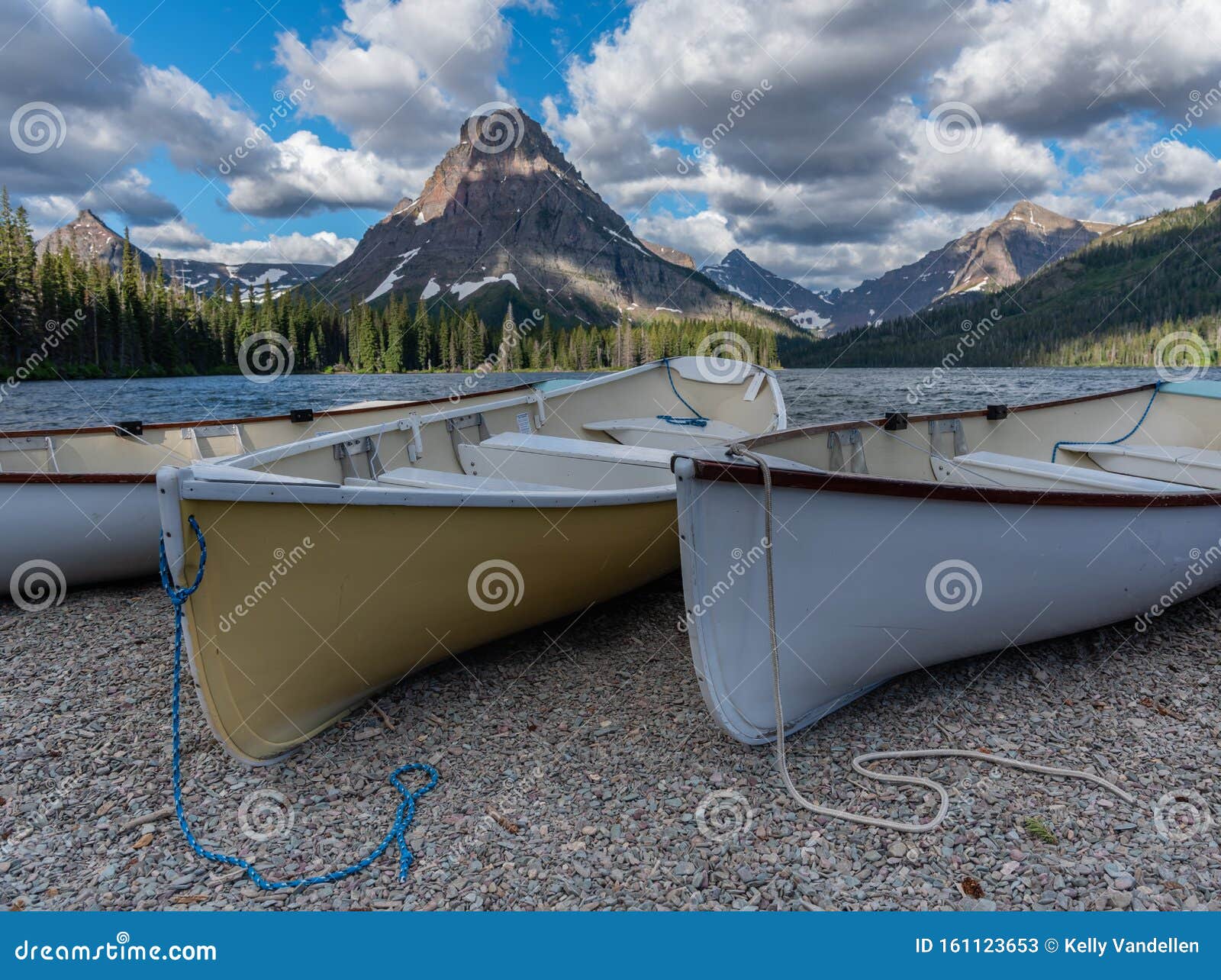 canoes along shore of two medicine lake