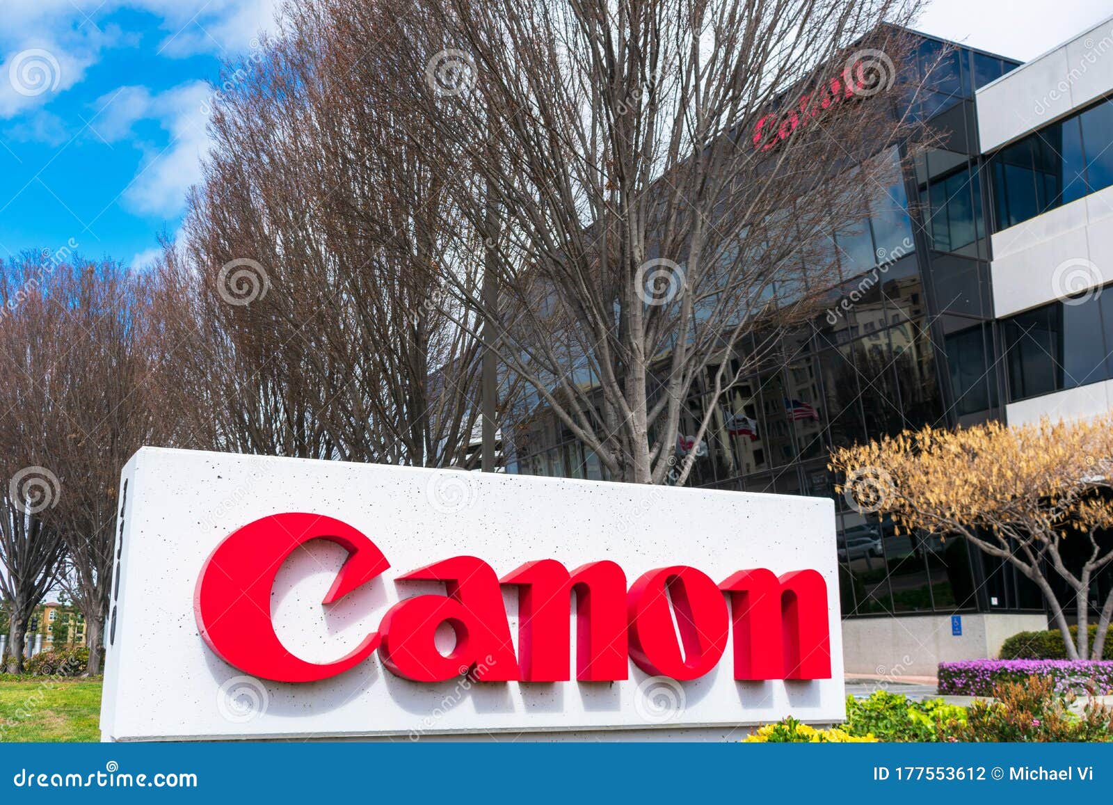 Canon Logo on Sign Post at Headquarters of Canon Solutions America