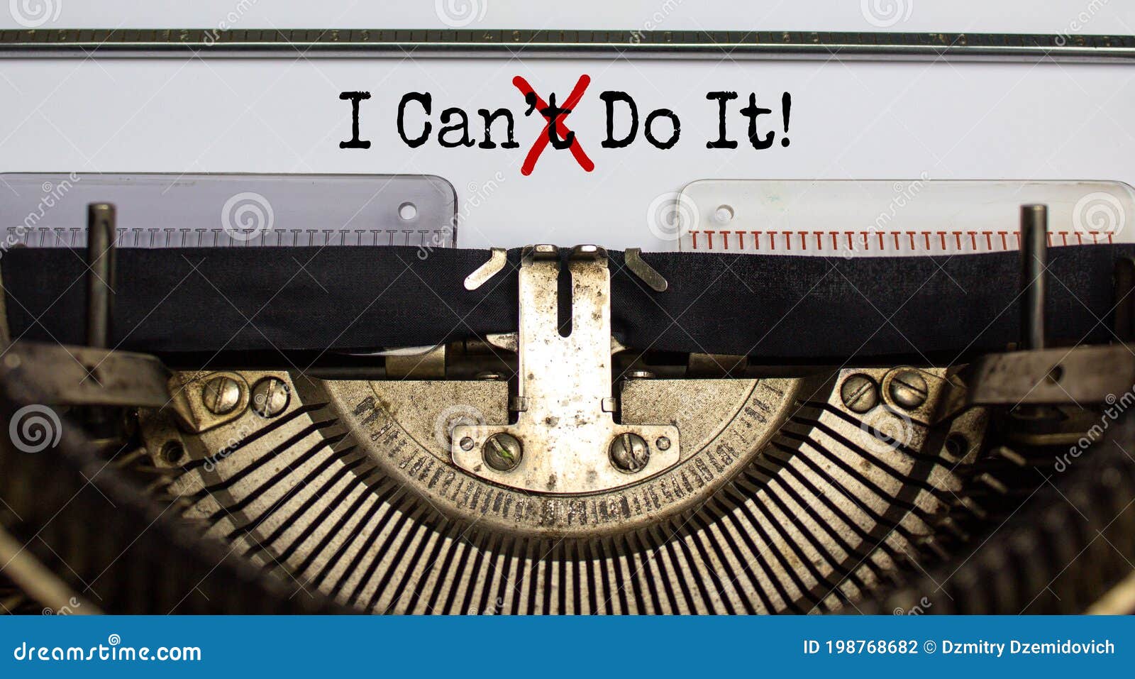 cant crossed out to read i can do it concept for self belief, positive attitude and motivation written on an old typewriter