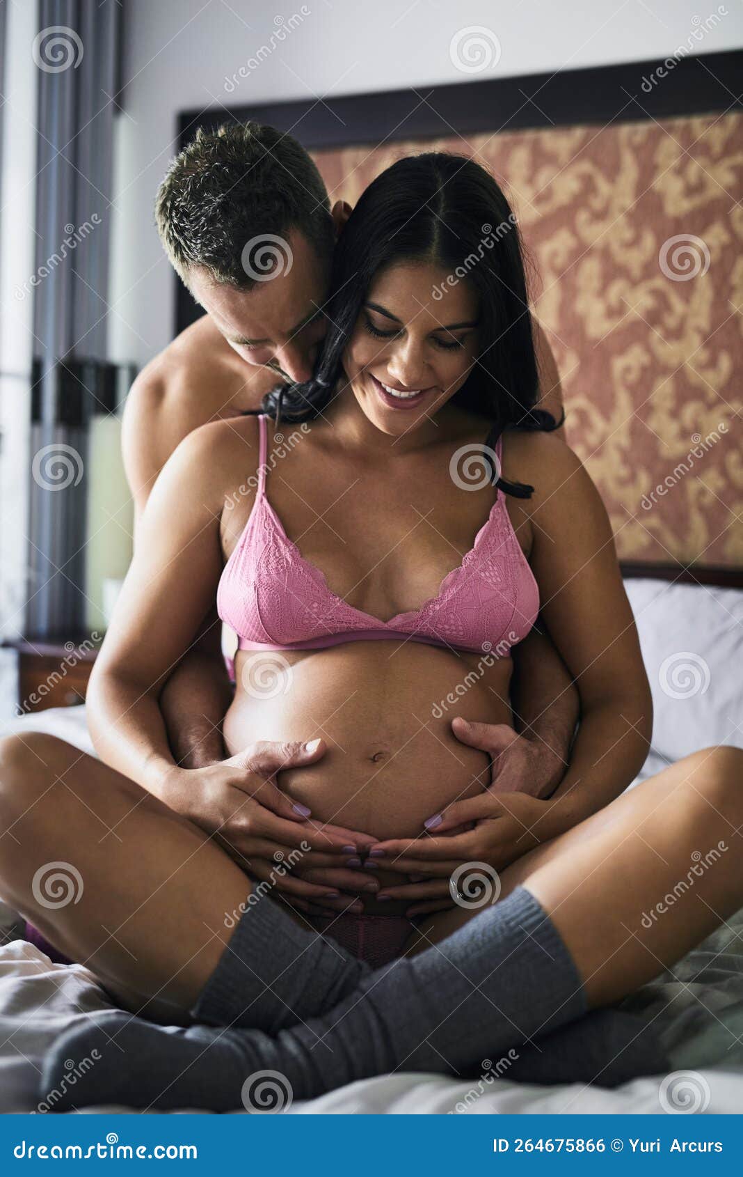 Pregnant Couple Lingerie Stock Photos