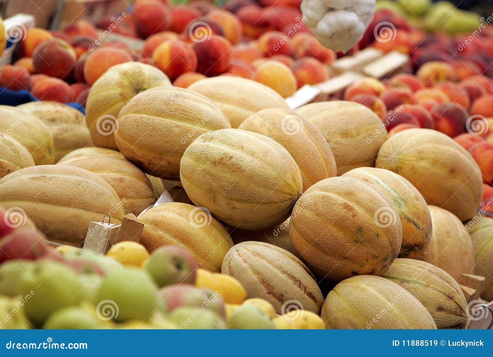 Cantaloupe,peaches and apples in one fruit street market during the summer
