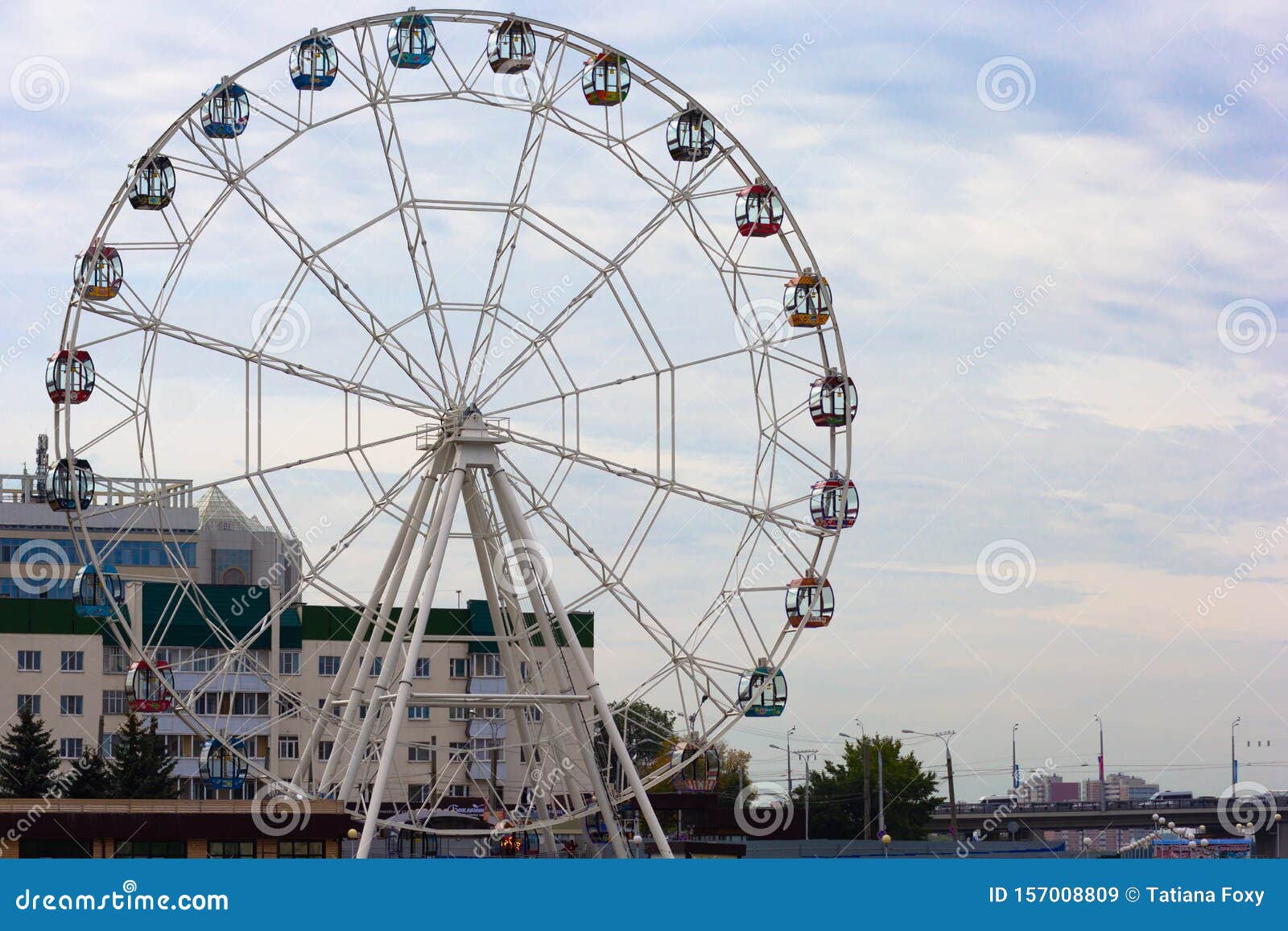 cantilevered observation wheel in ceboksary russia on the blue sky