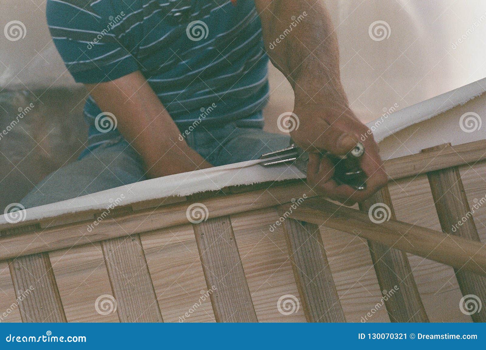 Canvas Canoe Manufacturing, Linen Stretch on a Canoe Stock Image